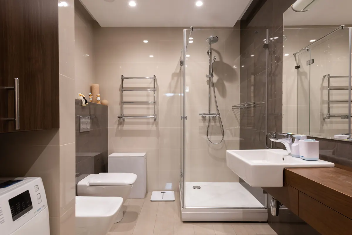 Bathroom with shower enclosure and coordinated fittings