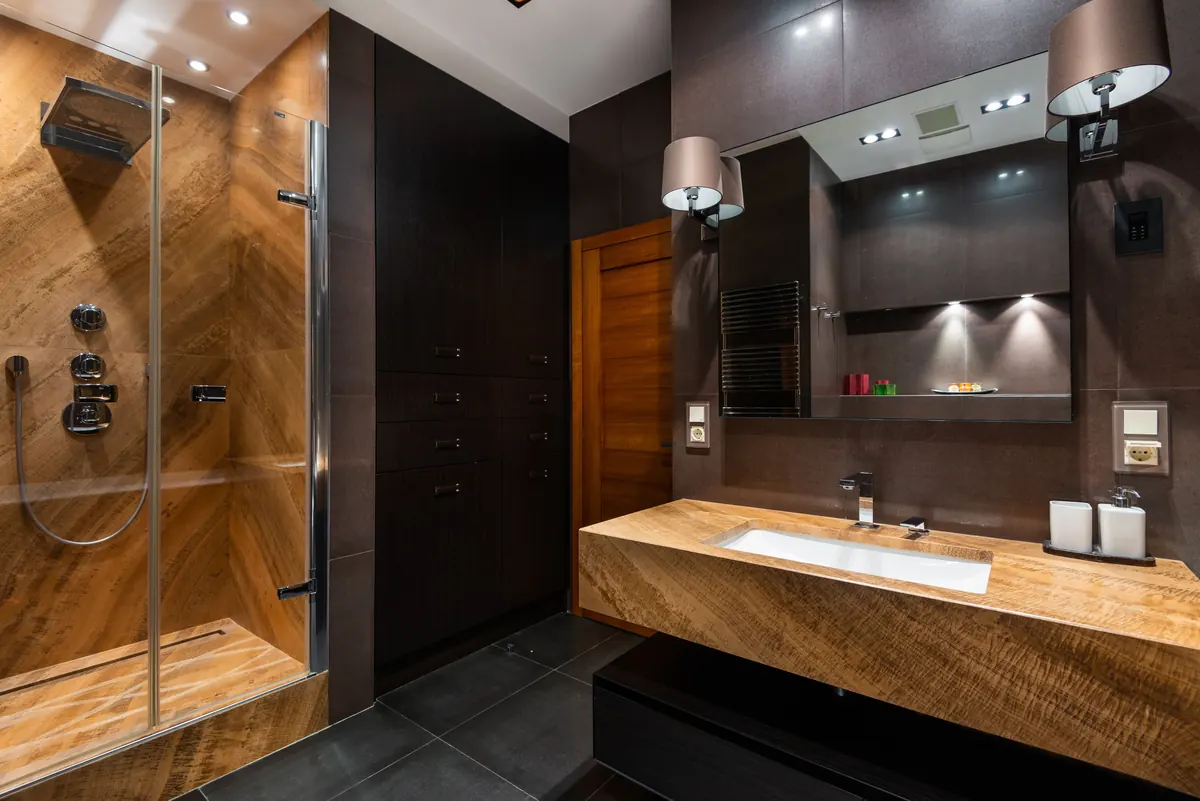 Bathroom display with shower, basin, and mirror fixtures