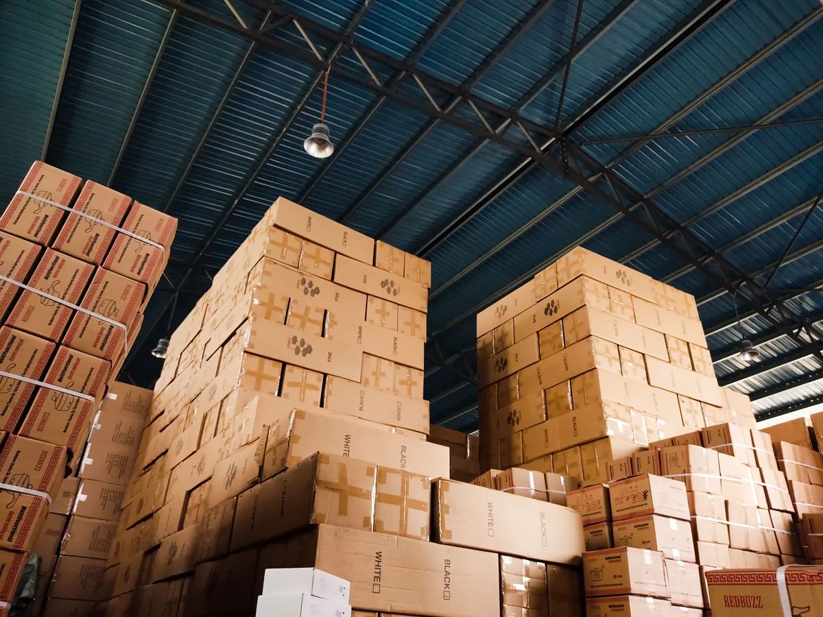 Stacks of packed cartons in a warehouse