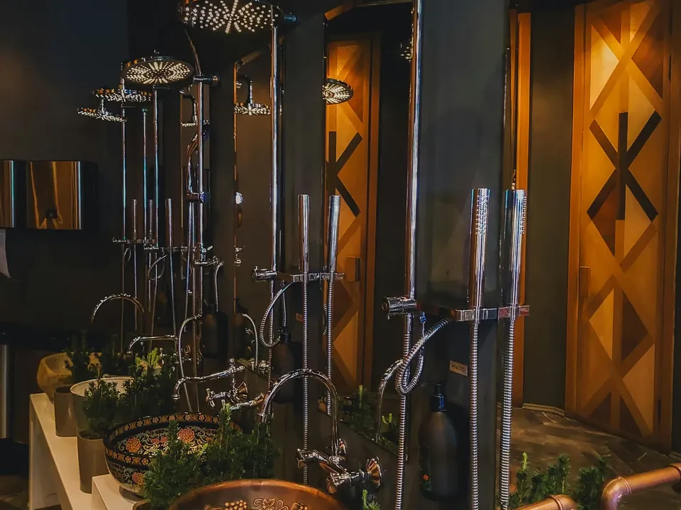Coordinated faucet and shower range displayed in a showroom